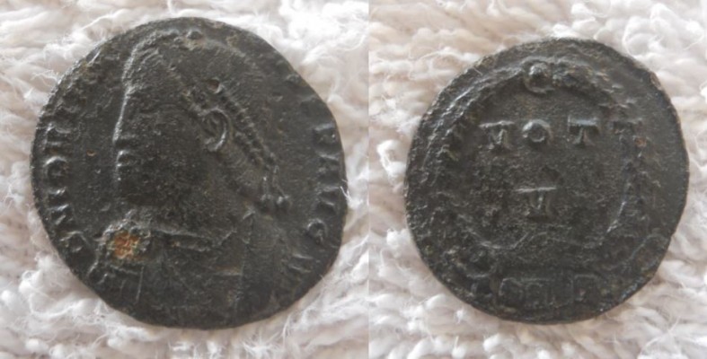 Jovian VOT X
Obverse:
Diademed and draped bust left
D N IOVIANVS P F AVG
D N: DOMINUS NOSTER - Our Lord 
IOVIANVS: Jovianus
P F: Pius Felix, Dutiful and Fortunate
AVG: Augustus, emperor

Reverse: 
VOT / V within wreath
VOT: Votis Vicennalibus, prayers for 5 years of rule
V: 5
Domination: Bronze centenionalis, size 18 mm
Mint, Constantinople and the mintmark is CONSP[?], 363 - 364 A.D
Exergue: 
Oficina: workshop (A,B etc.) RIC VIII Constantinople 178

Comments:
The reverse is pretty good, but if the photo of the obverse is accurate it might be an imitation.  The face and the drapery on the bust look fairly odd.  Worth looking at some other issues from Constantinople to see if they share the same characteristics as it might just be the work of a bad official engraver.  Overall it is not a type that was heavily imitated.

