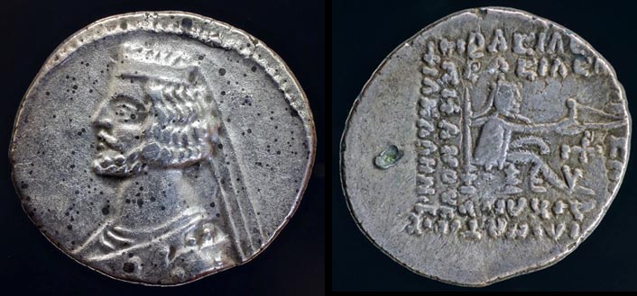 Orodes II.,  57 -38 BC
AR dr.,   3,96gr,   20,2mm;   Sellwood 43.7,   Shore 217,   Sunrise -;
mint:  Rhagai;   axis: 11h;
obv.:  bare-headed, left, w/broad diadem and 2 or 3 ribbons;  medium-long hair in 4 waves, mustache, short beard in 2 rows of curls;  cuirass;  dotted border 9 to 15h;
rev.:  archer, right, on throne, w/bow in one hand and monogram below; 7-line corrupted legend, blemish (test punch?) in left field; 
