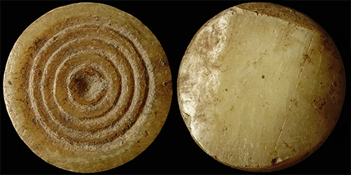 Roman, Disk-shape object, made from Bone, #01.
Roman, Disk-shape object, made from Bone, #01.
Jeton game or ???
avers:- Four concentric circular trench etched in the middle larger circular hollow.
revers:- Single sided,
diameter: 19,3mm, thickness:3,65mm, weight: 1,73g, 
mint: , date: A.D., ref: ,
ditribution: North Balkan,
Q-001
Keywords: Roman, Disk-shape object, made from Bone, #01.