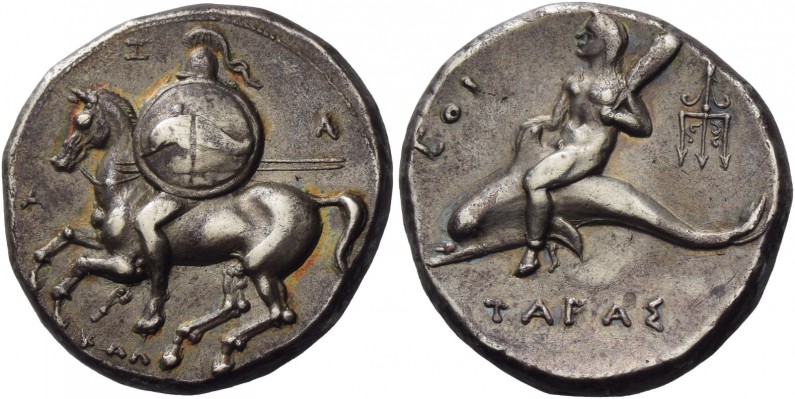 Calabria, Taras AR  Nomos circa 290-281
7.72 g
Helmeted horseman galloping l., holding spears and shield decorated with dolphin; below, KA&#923; and around, A – Z – &#923;. 
Rev. &#932;&#913;&#929;&#913;&#931; Dolphin rider l., holding distaff; in l. field, COI and in r. field, trident pointing downwards. 
Vlasto 650 (these dies). SNG Sweden II, 157. Fischer-Bossert 1136b (this coin illustrated). Historia Numorum Italy 940. 
Rare. Of pleasant style and with a lovely iridescent tone, minor marks, otherwise about extremely fine Ex Vinchon sale 13th April 1985, 22.
