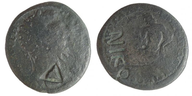 Δ and NIKO
MOESIA INFERIOR. Nikopolis ad Istrum. Septimius Severus. Æ 27. A.D. 193-211. Obv: (VK)ΛCEΠ•-CEVHPOC (...) or similar. Laureate bust right; countermark (1) on shoulder. Rev: VΠAVP•ΓAΛΛOV•NIKOΠOΛITΠPOCIC. River-god reclining left, leaning against urn (?), holding branch in right hand; Countermark (2) to left. Ref: BMC -. Axis: 60°. Weight: 11.68 g. CM(1): Δ, incuse punch, 7 x 6 mm. Howgego 782 (3 pcs). CM(2): NIKO, incuse, 14 x 5 mm. Howgego 553 (3 pcs, 2 of which on reverse). Note: All coins that have the Δ c/m apparently also bear the NIKO c/m and vice-versa, so they must have been applied at the same time. Collection Automan.
