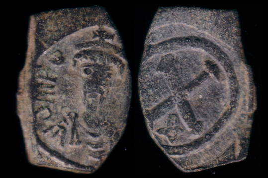 BYZANTINE, Phocas, AE Decanummium, A.D.602 - 610. 
Obv: om FOCA PP AVG. Crowned, draped and cuirassed bust facing.
Rev: Large X, cross above. (The reverse is upside down in the photograph above).

Sear: 646

