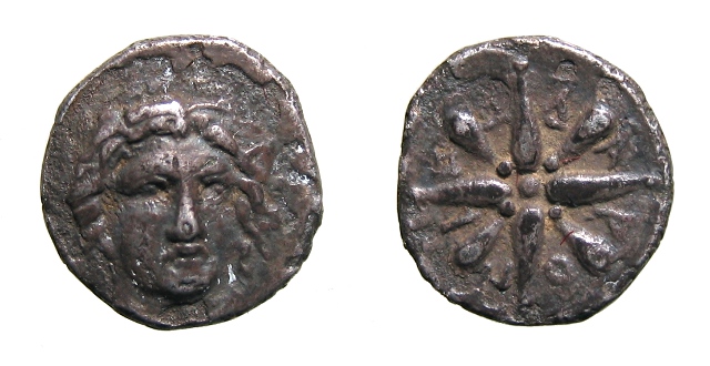 Caria, Pixodarus, trihemiobol
340-334 BC
10mm, 0.80g
obv: head of Apollo facing slightly right
rev: &Pi;I&#918;&Omega;&Delta;APO between eight rays of an ornament star
Klein 509
