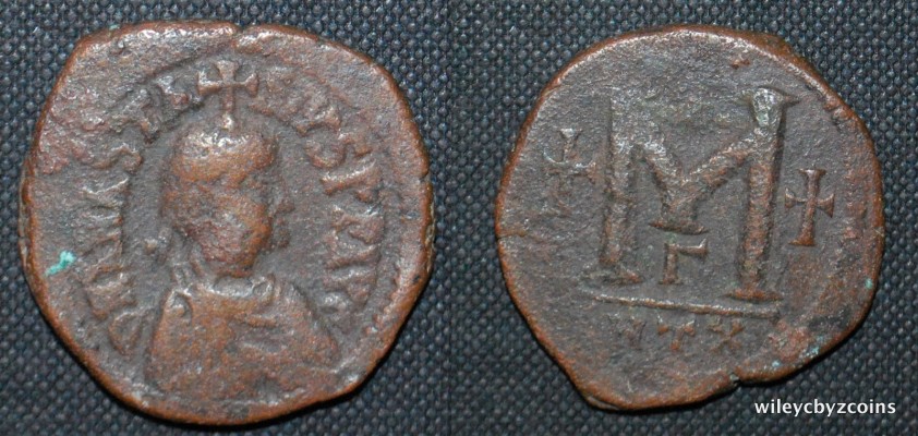 AE Follis Anastasius I SB 47
Obverse: DN ANASTASIVS PP AVG Diad, dr. and cuir, bust r., cross above.
Reverse: Large M between crosses, Officina letter "gamma" below. Mintmark ANTX
Date: 491-518 CE
Mint: Antioch
SB 47 DO 45
31mm, 17.18g
