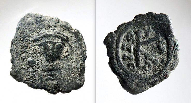 BCC B49 Maurice Half Follis Nicomedia
Byzantine Period
Maurice Tiberius 582-602 CE
AE Half Follis, Nicomedia
Obv: dN M...[    ] or similar. 
Maurice facing, wearing crown and
cuirassed, holding globus cruciger in 
right hand and shield on left shoulder.
Rev: Large K, to left ANNO, above, 
cross, below A, to right, date: G/I 
(Regnal Year 7=588/9 CE).
26mm. 5.29gm. Axis:195 (6/7Hr). 
cf. DOC 114.v (officina); and SB 514
Possible die match to BCC B48.
Surface find Caesarea Maritima, ca. 1976
J. Berlin Caesarea Collection

