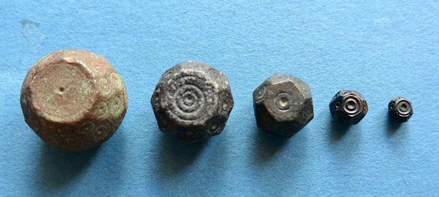 BCC BW1-BW5 Islamic Weights Dirham Series
5 Islamic Bronze Weights
Caesarea Maritima
Fatimid? 10th -12th Century CE
Five Polyhedral, (Faceted Truncated Spheres)
with bird's-eye markings in horizontal rows.
Dirham series based on a unit of about 2.9 gm.
multiplied decimally and divided duodecimally.
1.  20 Dirham, Dia. 24mm. 57.71gm.
2.  10 Dirham, Dia. 18mm.  28.70gm.
3.  5 Dirham, Dia. 14mm. 14.16gm.
4.  1 Dirham, Dia. 8mm.    2.86gm.
5.  1/3 Dirham, Dia. 6mm.   0.96gm.
The largest weight is very close to 60x the 
smallest.  cf. Holland, W.W.O.C.M. #123-#128 
and Holland, "ANSMN 31 (1986)" #3-#39
Surface finds Caesarea Maritima, 1970's
J. Berlin Caesarea Collection
