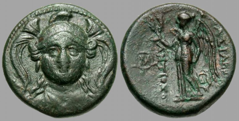 Seleukid Empire: Antiochos I Soter (281-261 BCE) Æ Unit, Smyrna or Sardes (SC 314; HGC 9, 145)
Obv: Head of Athena facing, wearing triple-crested Attic helmet
Rev: [i]&#914;&#913;&#931;&#921;&#923;&#917;&#937;&#931; &#913;&#925;&#932;&#921;&#927;&#935;&#927;&#933;[/i]; Nike standing left, holding wreath; in outer left field, monogram; below wing, &#916;&#921; within wreath

